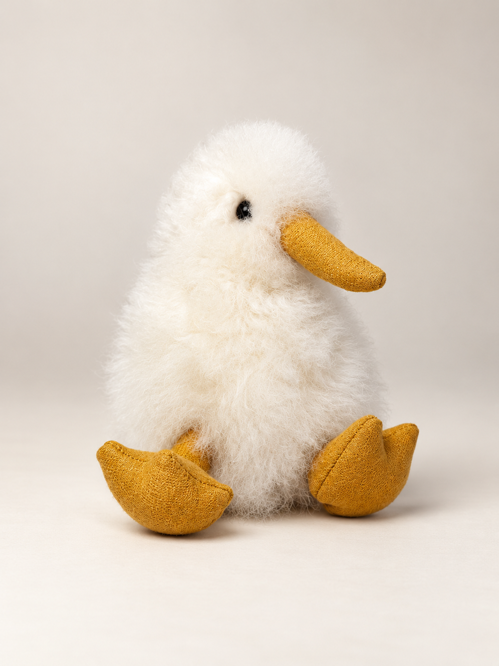 Kiwi Kuscheltier aus 100 % Baby Alpaka Wolle